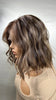 Opal highlighted loose wave bob wig — lifestyle side profile